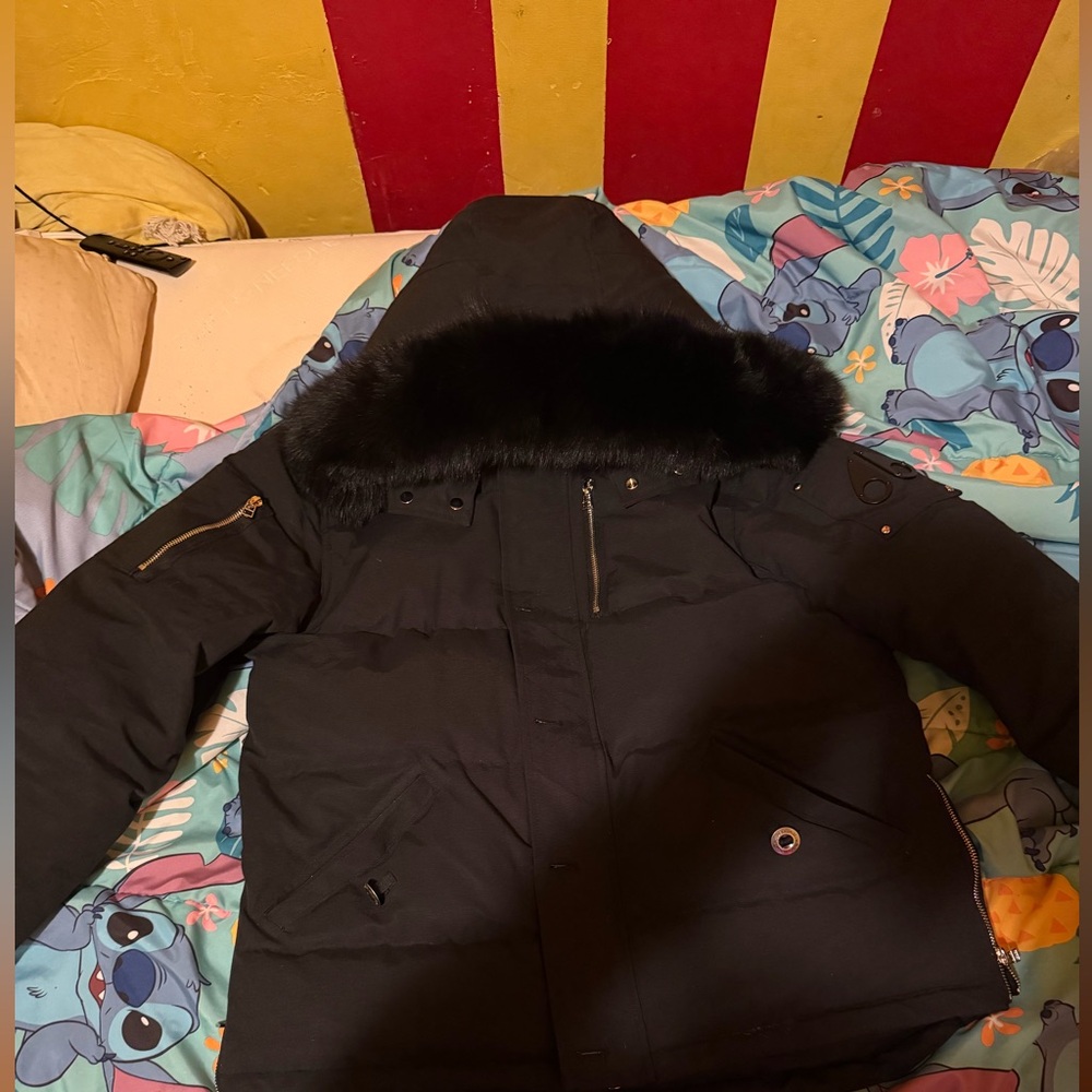 moose knuckle , black logo and fur , size medium